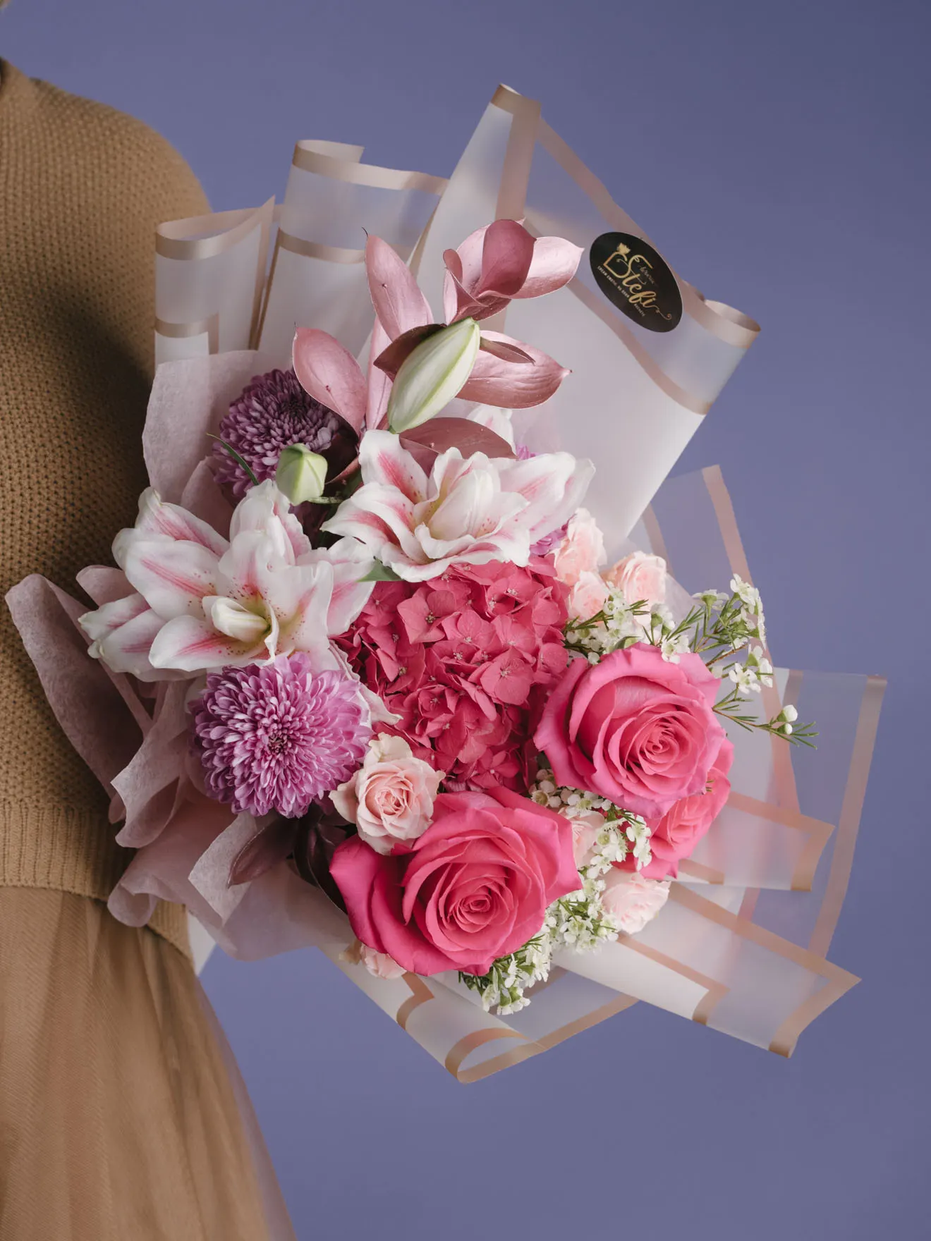 A bouquet of flowers in shades of pink from a local flower shop found on Google Maps